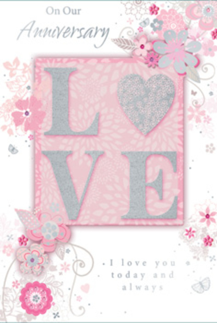 The image shows an anniversary card that feels as tender and thoughtfully composed as a bespoke bouquet created for a long-married couple in Dartford. At the heart of the design, the word LOVE stretches across the card in large, raised letters, each one dusted with glitter that shifts gently between blush pink, soft white, and delicate silver. The texture of the letters is clearly visible, suggesting a pleasant grain under the fingertips, like the fine shimmer of gypsophila tucked between roses in an intimate anniversary arrangement. Surrounding this central word, a haze of soft pink forms the background, deepening slightly around the edges to frame the composition with a subtle glow. Along the sides and corners, slender, hand-drawn blooms and leaves meander with a relaxed grace, their outlines echoing the fluidity of stems arranged by an expert florist at Flower Delivery Dartford. Petals in muted blush, ivory, and silvery grey blend in gentle gradients, hinting at early spring blossoms you might see near Dartford Park or along the quieter residential streets. Tiny flourishes-spirals, tendrils, and almost-hidden buds-add movement and a hint of whimsy, as though the floral lines are gently swaying in a light breeze. Across the card, messages of affection and commitment are printed in an elegant, flowing script, their curves mirroring the arcs of the vines. The mood is soft, peaceful, and deeply romantic, evoking evenings spent together at home, a vase of fresh flowers on the table and the quiet comfort of shared history. This card appears less like a simple greeting and more like a keepsake, a paper echo of a bouquet chosen with care and delivered with love across Dartford.